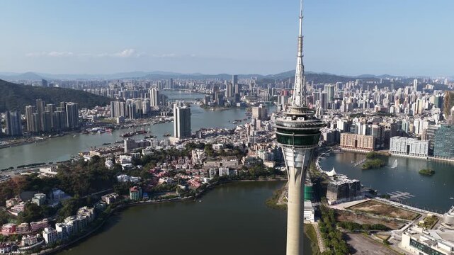 Aerial view of macau tower and modern cityscape