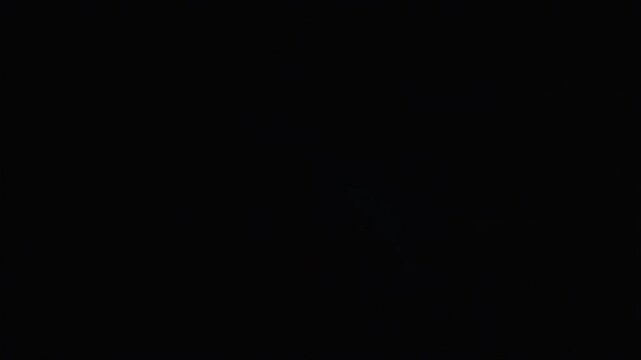 Lightning bolt striking with intense glowing blue plasma energy creating a dramatic electrical surge in a dark night sky