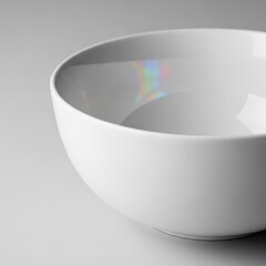 Luxurious closeup of a brilliant white porcelain bowl featuring a smooth, reflective surface and an exquisite, high-gloss ceramic glaze finish, upscale, white, sophisticated