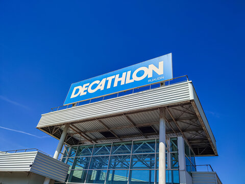 Le Mans, France - April 24, 2026: Decathlon store exterior with large sign under clear blue sky showcasing modern architecture and design elements