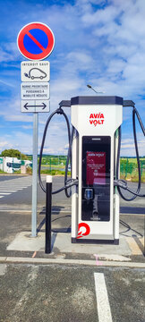 Sarthe Touraine, France - May 15, 2026: Avia Volt electric vehicle charging station with multiple charging cables in outdoor setting, no parking sign visible