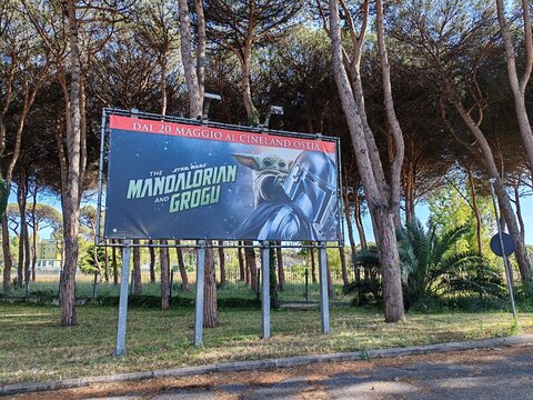 Ostia, Rome, Italy - May 18, 2026, a large canvas panel depicting The Mandalorian and Grogu, the 2026 science fiction film directed by Jon Favreau and produced by Lucasfilm.