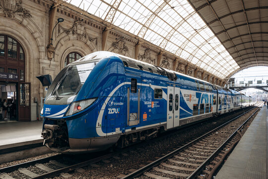Nice, France - May 16, 2026: Modern blue TER regional train operated by ZOU! and Transdev standing at Nice Ville railway station in Nice, France