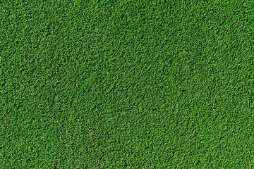 Artificial green grass texture background. Close up of synthetic turf pattern for soccer field or golf course. © nguyenhuu