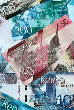 Kenyan shilling money banknotes pile on table. Kenya bills of KES currency. Concept of economy