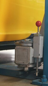 Car service work - yellow car drives to garage