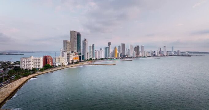 Drone view from ocean of entire Bocagrande skyline with modern high rise buildings and hotels in Cartagena, Colombia. Aerial, copy space