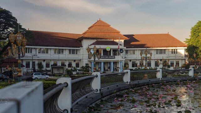 day to night timelapse of balai kota malang, jawa timur, indonesia