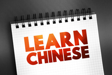 Fototapeta premium Learn Chinese text quote on notepad, concept background