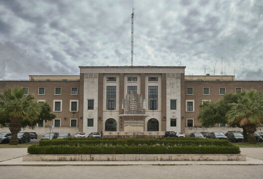 The Government Palace shown in the image is located in Latina and is a 1930s building built in fascist architectural style.