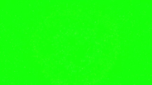 Glowing particles burst in green background with smoke effects