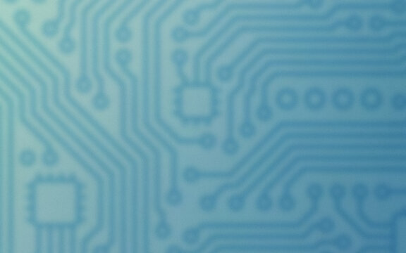 Close-up of a blurred one hundred dollar bill with security features