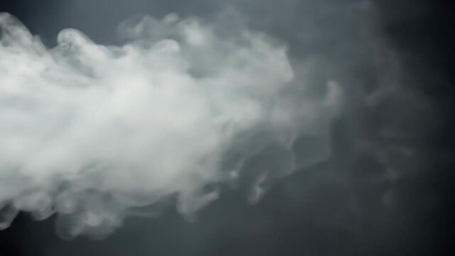 Dense, pure white, ethereal smoke unfurling, billowing horizontally across an absolute black void, softly illuminated, fading into nothingness. High-resolution VFX element for compositing concept