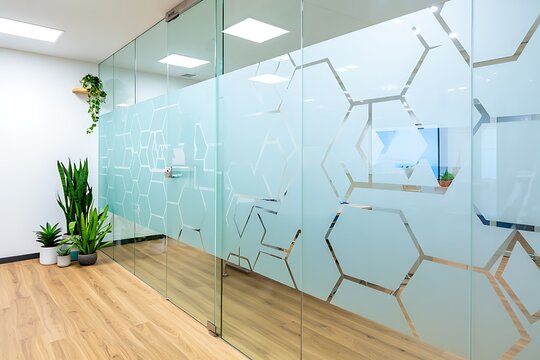 Modern frosted glass film with elegant dot pattern enhances office privacy, meeting rooms, and corporate interiors while maintaining natural light and contemporary decorative aesthetics.