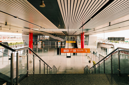 Modern Interior with Staircases and Directional Signage at the Nairobi SGR Terminus, Kenya