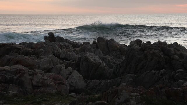 rocky coastline of DeKelders, Gansbaai, South Africa at sunset
