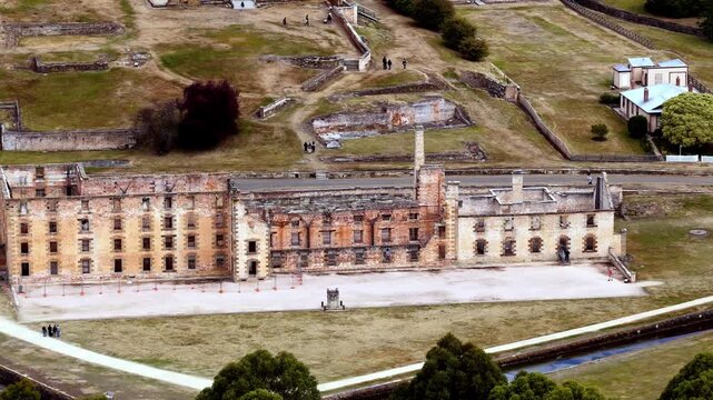 Facade of main building in Port Arthur historic penitentiary in close aerial landscape view &ndash; Tasmania landmark.