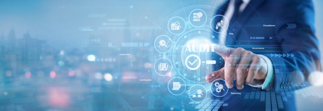 Financial controller. Senior corporate accountant touching Audit virtual screen to verify official compliance reports, analyze balance sheets, and track transaction logs. Risk management.