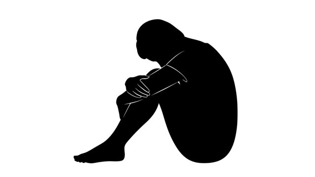 Sad person sitting alone depressed.