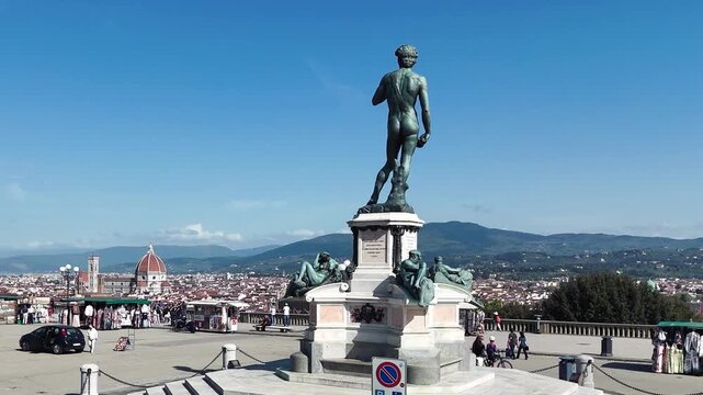 Drone perspective of David statue replica overlooking Florence from Piazzale Michelangelo
