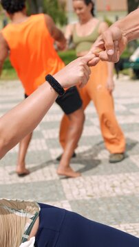 Casual meet involving trust and friendly gestures outdoors