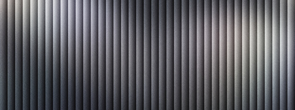 Industrial corrugated metal texture background. Dark grey ribbed steel wall with vertical lines and metallic sheen. Modern architectural aluminum siding surface for construction and design.