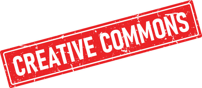 Grungy red rubber stamp impression reading CREATIVE COMMONS in distressed white letters