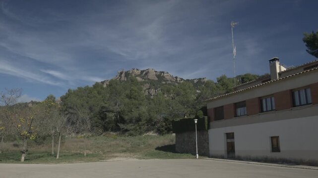 Sant Llorenc mountain sky clouds jib crane Polecam building Matadepera