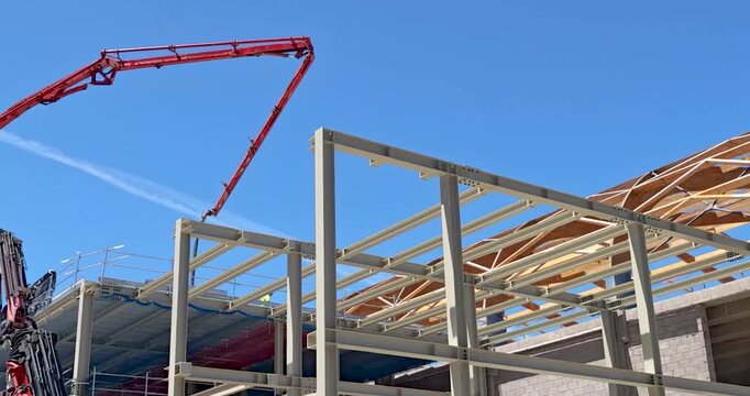 Building Roof Renovation Showing Reinforced Concrete, Wooden Structure and Steel Frame Construction Techniques. Not recognizable people.