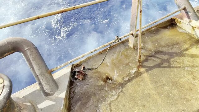 vessel scupper opening and discharge dirty water from the ship to the ocean