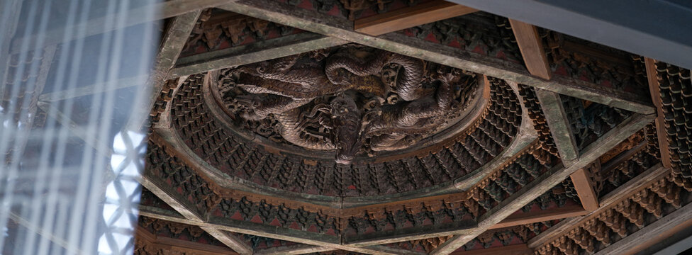 Exquisite Dragon Wood Carvings on Ancient Beijing Ceiling Canopies