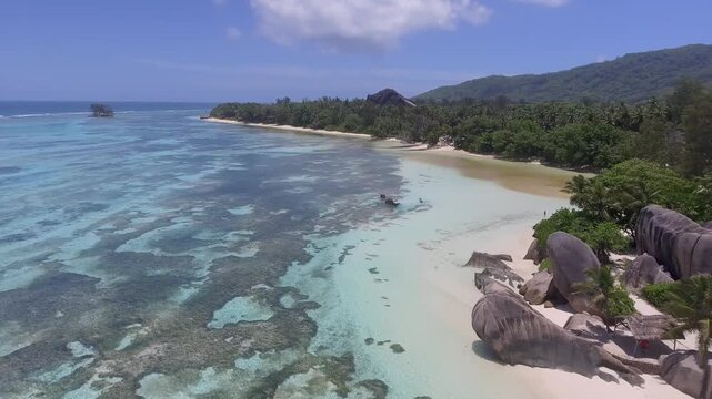 Anse Source D'Argent view on la digue island in Seychelles, aerial view in slow motion