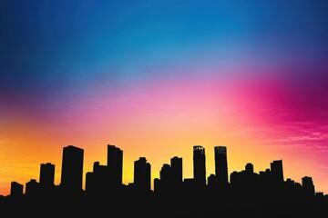 Fototapeta premium Silhouetted city skyline with colorful sky in minimalist style during evening hours
