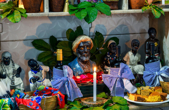A decorated altar in homage to the Old Black Man inside an Umbanda temple.