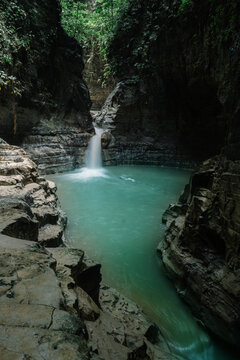 Waimarang Waterfall Three Tiered Limestone Cascade and Turquoise Pool in East Sumba