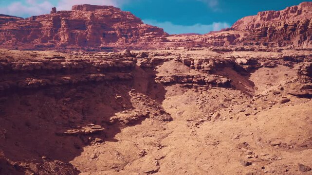 remote canyon route suggesting offgrid exploration and overland travel, rugged tracks and rocky outcrops under open sky, warm ochre tones and tactile textures