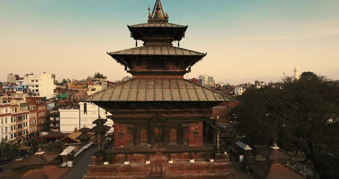 Stunning aerial close-up of the towering Taleju Bhawani Temple in Basantapur Durbar Square, with its tiered pagoda roofs rising above the surrounding Newari heritage buildings.