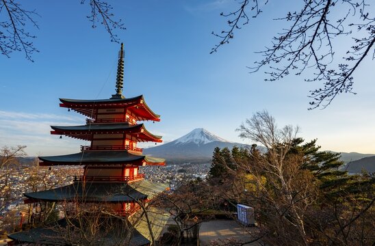 Five-story pagoda of a Shinto Shrine, Chureito Pagoda, with views of Fujiyoshida City and Mount Fuji volcano at sunset, Arakura Fuji Sengen Shrine, Arakurayama Sengen Park, Yamanashi Prefecture, Japan