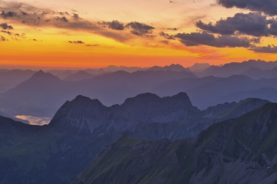 View from Brienzer Rothorn on Central Swiss Alps, cloudy atmosphere at dawn, Canton Bern, Canton Obwaden, Switzerland