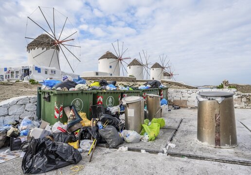 Overcrowded trash cans, problem of mass tourism, windmills, Mykonos, Cyclades, Aegean Sea, Greece