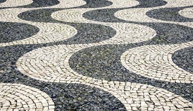 Black and white undulating plaster motif, Rossio, Pra&ccedil;a Rossio, Lisbon, Portugal