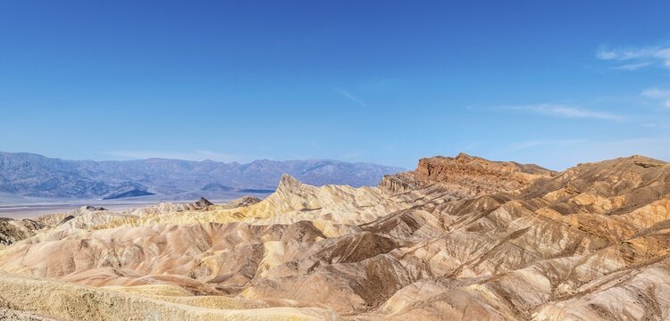 Manly Beacon rock, Badlands, Zabriskie Point,  Panamint Range behind, Death Valley National Park, California, USA