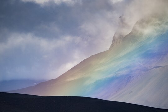 Rainbow and clouds, flank of table volcano Her&eth;ubrei&eth; or Herdubreid, Icelandic highlands, Iceland