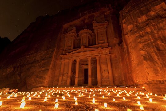 Candles in front of the Pharaoh's treasure house, struck in rock, at night, facade of the treasure house Al-Khazneh, Khazne Faraun, mausoleum in the Nabataean city Petra, near Wadi Musa, Jordan