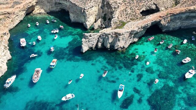 Aerial drone view of turquoise waters at Comino Blue Lagoon, Malta