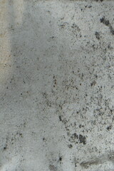 Fototapeta premium Weathered Concrete Wall Texture With Grime Stains And Rough Urban Plaster Surface Closeup
