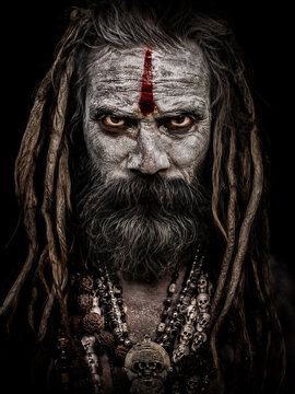 Intense Close Up Portrait of Aghori Sadhu 
with Tilak and Dreadlocks, Powerful Hindu 
Holy Man Face, Indian Mysticism Art