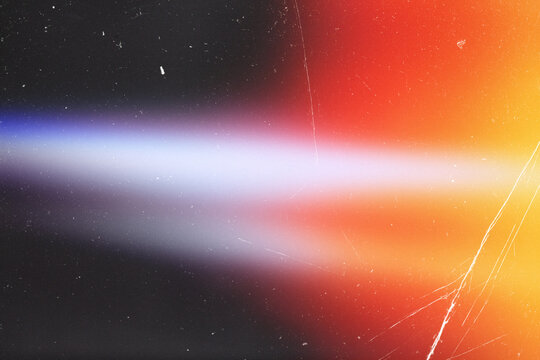 light leak overlay effect with scratch dust and motion blur orange light leaks,retro noisy film texture light leak flare on black background,abstract background with ray,grunge film strip background