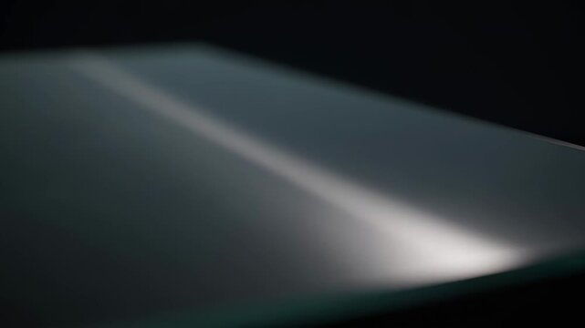 Light reflection on abstract surface in soft focus: a subtle dance of illumination