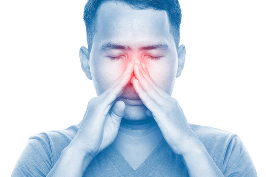 Man suffering from sinus pain touching nose area with red inflammation highlight for healthcare concepts, sinusitis symptoms, respiratory problems, and medical awareness themes.